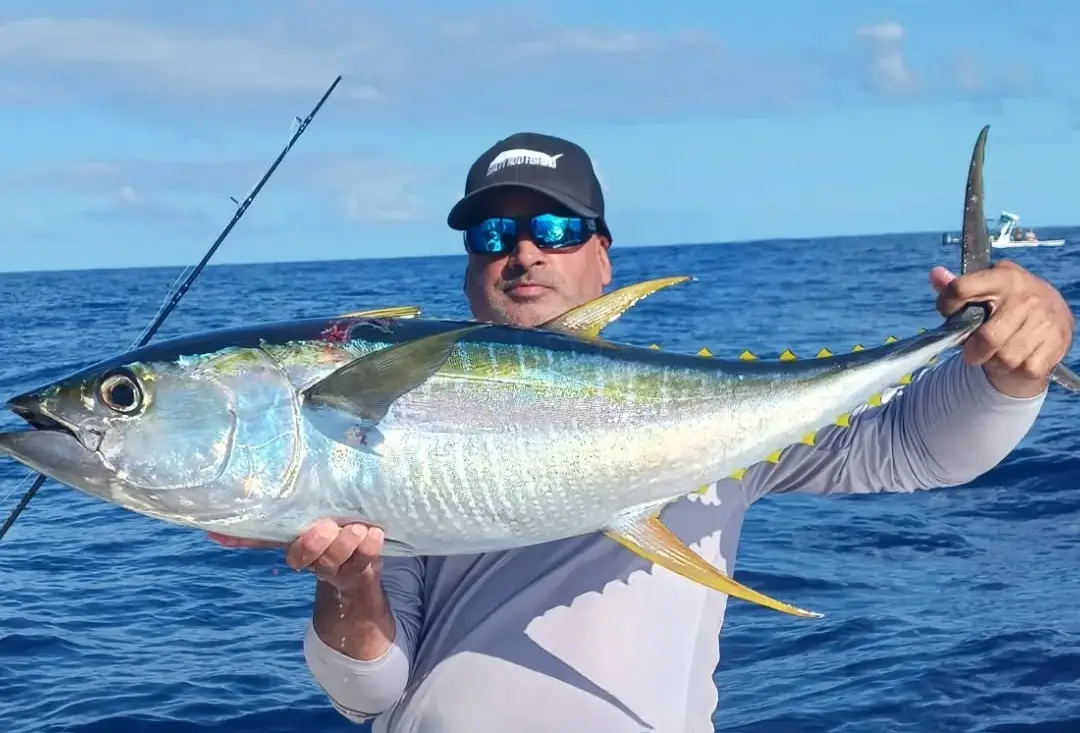 Family with a full catch of tuna on a Salty Rod Fishing trip in Aguadilla Puerto Rico